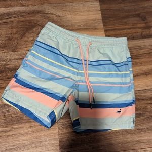 Properly tied swim trunks boys